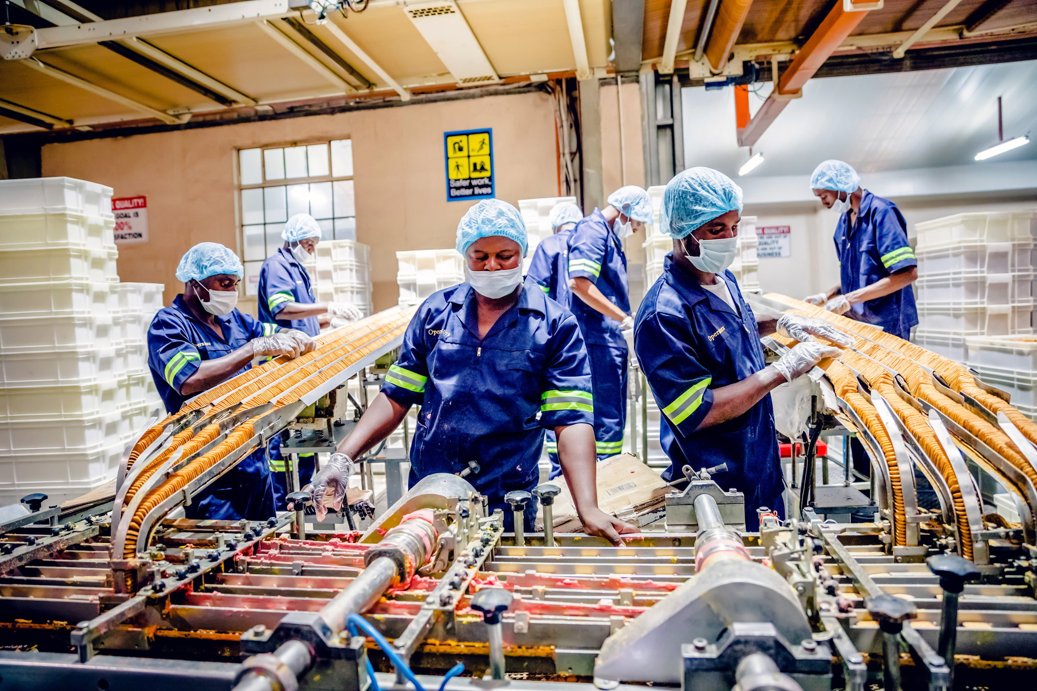 Production Line Workers at a Biscuit Factory in Africa - IGC